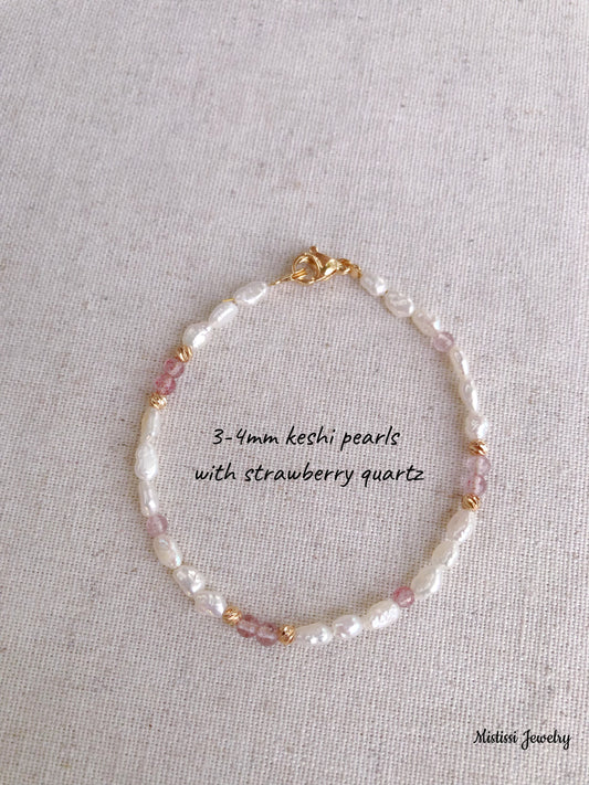 Bracelet with keshi pearls and strawberry quartz on a light gray background