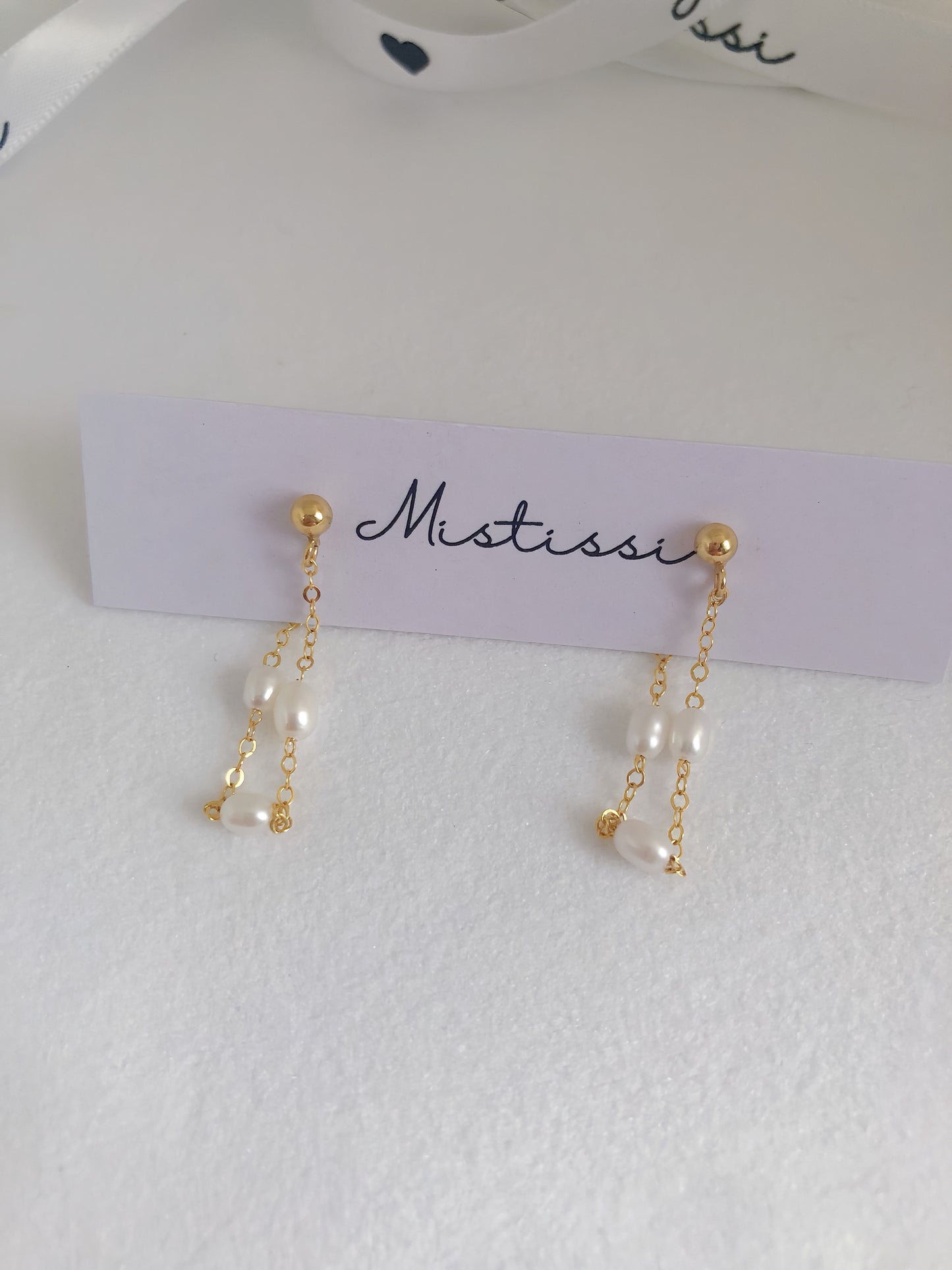Micro de Mistissi Seed Rice Pearl Chain Dangle Earrings