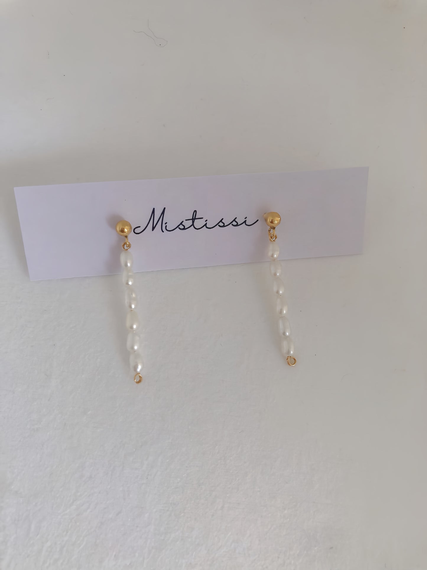 Micro de Mistissi Seed Rice Pearl Dangle Earrings