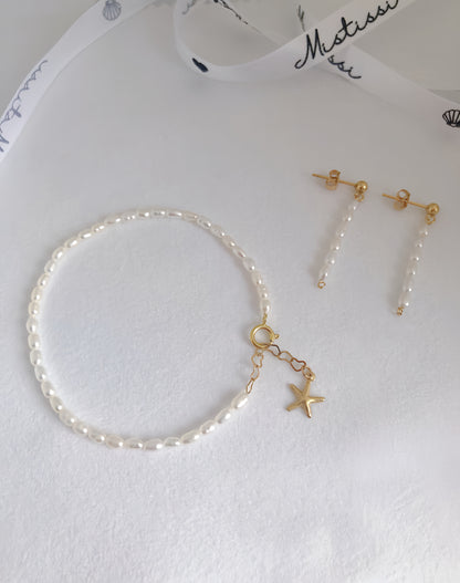 Micro de Mistissi Seed Rice Pearl Dangle Earrings