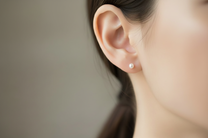 Model wearing 4.5mm pearl stud earring